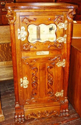 Rare highly carved oak parlor ice box  